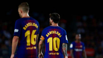 BARCELONA, SPAIN - AUGUST 20: Lionel Messi (2ndL) of FC Barcelona and his teammate Gerard Deulofeu (L) walk wearing the t-shirt in memory of victims of the terrorist attack in Barcelona this week during the La Liga match between FC Barcelona and Real Betis Balompie at Camp Nou stadium on August 20, 2017 in Barcelona, Spain. (Photo by Gonzalo Arroyo Moreno/Getty Images)