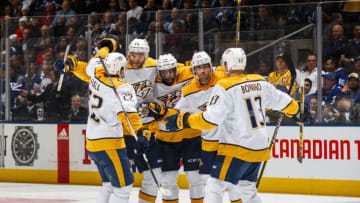 TORONTO, ON - JANUARY 7: Mattias Ekholm #14 of the Nashville Predators celebrates his goal with teammates Kevin Fiala #22, P.K. Subban #76, Craig Smith #15 and Nick Bonino #13 during the second period against the Toronto Maple Leafs at the Scotiabank Arena on January 7, 2019 in Toronto, Ontario, Canada. (Photo by Mark Blinch/NHLI via Getty Images)