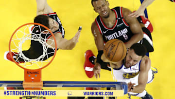 OAKLAND, CALIFORNIA - MAY 14: Stephen Curry #30 of the Golden State Warriors shoots the ball against Rodney Hood #5 of the Portland Trail Blazers during the second half in game one of the NBA Western Conference Finals at ORACLE Arena on May 14, 2019 in Oakland, California. NOTE TO USER: User expressly acknowledges and agrees that, by downloading and or using this photograph, User is consenting to the terms and conditions of the Getty Images License Agreement. (Photo by Ezra Shaw/Getty Images)