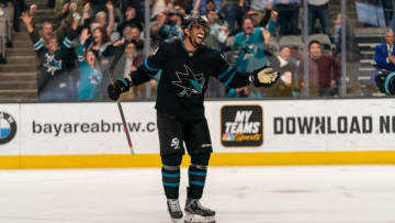 San Jose Sharks left wing Evander Kane (9) celebrates after the winning goal during overtime against the New Jersey Devils at SAP Center at San Jose. Mandatory Credit: Neville E. Guard-USA TODAY Sports