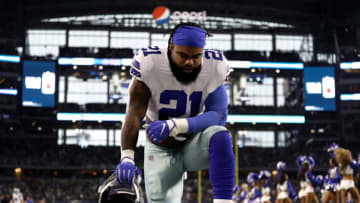 ARLINGTON, TEXAS - NOVEMBER 28: Ezekiel Elliott #21 of the Dallas Cowboys takes a knee in the endzone before a game against the Buffalo Bills at AT&T Stadium on November 28, 2019 in Arlington, Texas. (Photo by Ronald Martinez/Getty Images)
