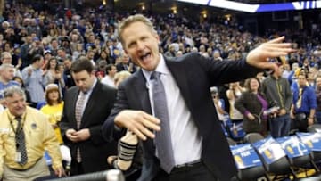 Jan 22, 2016; Oakland, CA, USA; Golden State Warriors head coach Steve Kerr gestures towards the media before the start of the game against the Indiana Pacers at Oracle Arena. Mandatory Credit: Cary Edmondson-USA TODAY Sports