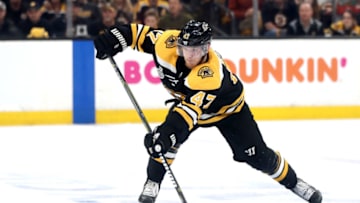BOSTON, MASSACHUSETTS - JUNE 06: Torey Krug #47 of the Boston Bruins attempts a shot against the St. Louis Blues during the third period in Game Five of the 2019 NHL Stanley Cup Final at TD Garden on June 06, 2019 in Boston, Massachusetts. (Photo by Adam Glanzman/Getty Images)