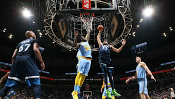 MINNEAPOLIS, MN - JANUARY 1: Karl-Anthony Towns #32 of the Minnesota Timberwolves goes up for a dunk against the Los Angeles Lakers on January 1, 2018 at Target Center in Minneapolis, Minnesota. NOTE TO USER: User expressly acknowledges and agrees that, by downloading and or using this Photograph, user is consenting to the terms and conditions of the Getty Images License Agreement. Mandatory Copyright Notice: Copyright 2018 NBAE (Photo by David Sherman/NBAE via Getty Images)
