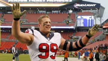 Houston Texans defensive end J.J. Watt (99) waves to fans after beating the Cleveland Browns 23-7 at FirstEnergy Stadium. Mandatory Credit: Ron Schwane-USA TODAY Sports