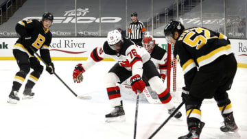 BOSTON, MASSACHUSETTS - FEBRUARY 18: P.K. Subban #76 of the New Jersey Devils defends a shot from Sean Kuraly #52 of the Boston Bruins during the third period at TD Garden on February 18, 2021 in Boston, Massachusetts. The Devils defeat the Bruins 3-1. (Photo by Maddie Meyer/Getty Images)