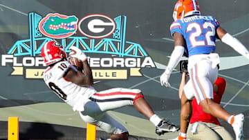 Georgia Bulldogs wide receiver Kearis Jackson (10) catches a touchdown pass in the end zone during the annual Florida Georgia rivalry game at TIAA Bank Field in Jacksonville Fla. October 30, 2021.Flagi 103021 Florida Georgia Fb 31
