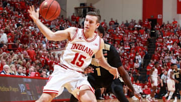 Feb 20, 2016; Bloomington, IN, USA; Indiana Hoosiers guard Harrison Niego (15) briefly looses the handle on the ball against Purdue Boilermakers guard Johnny Hill (1) at Assembly Hall. Indiana defeat Purdue 77-73. Mandatory Credit: Brian Spurlock-USA TODAY Sports