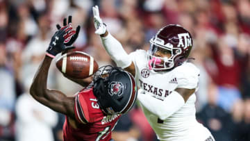 Oct 22, 2022; Columbia, South Carolina, USA; South Carolina Gamecocks wide receiver Jalen Brooks (13) cannot come up with the reception as Texas A&M Aggies defensive back Tyreek Chappell (7) defends in the second quarter at Williams-Brice Stadium. Mandatory Credit: Jeff Blake-USA TODAY Sports