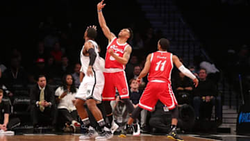 Feb 10, 2016; Brooklyn, NY, USA; Memphis Grizzlies shooting guard Courtney Lee (5) steals the ball from Brooklyn Nets small forward Joe Johnson (7) in front of Memphis Grizzlies point guard Mike Conley (11) during the first quarter at Barclays Center. Mandatory Credit: Brad Penner-USA TODAY Sports