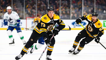 BOSTON, MA - FEBRUARY 04: Charlie McAvoy #73 of the Boston Bruins skates with the puck during a game against the Vancouver Canucks at TD Garden on February 4, 2020 in Boston, Massachusetts. (Photo by Adam Glanzman/Getty Images)