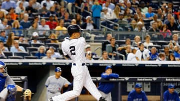NEW YORK, NY - SEPTEMBER 18: (NEW YORK DAILIES OUT) Derek Jeter #2 of the New York Yankees follows through on a sixth inning home run against the Toronto Blue Jays at Yankee Stadium on September 18, 2014 in the Bronx borough of New York City. The Yankees defeated the Blue Jays 3-2. (Photo by Jim McIsaac/Getty Images)