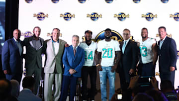 MIAMI, FL - AUGUST 17: Chris Grier, Adam Gase, Mike Tannenbaum, Jim Allen, Miami Dolphins players (