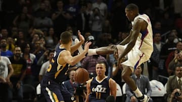 Oct 10, 2016; Los Angeles, CA, USA; Los Angeles Clippers guard Jamal Crawford (right) loses the ball while attempting a shot defended by Utah Jazz guard Dante Exum (11) during the fourth quarter at Staples Center. The Utah Jazz won 96-94. Mandatory Credit: Kelvin Kuo-USA TODAY Sports