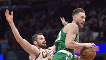 Nov 5, 2019; Cleveland, OH, USA; Boston Celtics forward Gordon Hayward (20) rebounds the ball against Cleveland Cavaliers forward Kevin Love (0) in the fourth quarter at Rocket Mortgage FieldHouse. Mandatory Credit: David Richard-USA TODAY Sports