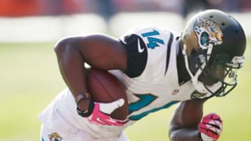 Oct 13, 2013; Denver, CO, USA; Jacksonville Jaguars wide receiver Justin Blackmon (14) during the game against the Denver Broncos at Sports Authority Field at Mile High. Mandatory Credit: Chris Humphreys-USA TODAY Sports