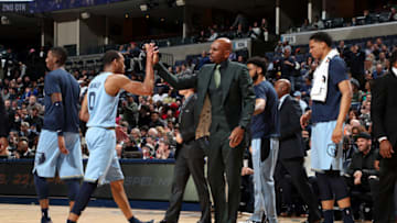 MEMPHIS, TN - FEBRUARY 12: Avery Bradley #0 hi-fives Assistant Coach Jerry Stackhouse on February 12, 2019 at FedExForum in Memphis, Tennessee. NOTE TO USER: User expressly acknowledges and agrees that, by downloading and or using this photograph, User is consenting to the terms and conditions of the Getty Images License Agreement. Mandatory Copyright Notice: Copyright 2019 NBAE (Photo by Joe Murphy/NBAE via Getty Images)
