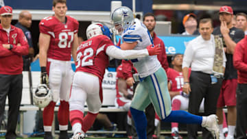 November 2, 2014: Arizona Cardinals safety Tyrann Mathieu (32) tries to bring down Dallas Cowboys tight end Jason Witten (82) after a catch during a football game between the Dallas Cowboys and Arizona Cardinals at AT