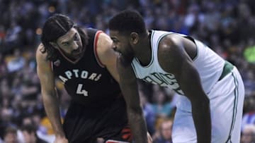 Mar 23, 2016; Boston, MA, USA; Boston Celtics forward Amir Johnson (90) talks to Toronto Raptors forward Luis Scola (4) during the first half at TD Garden. Mandatory Credit: Bob DeChiara-USA TODAY Sports