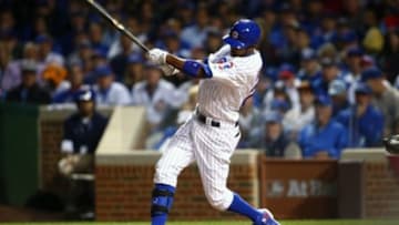October 20, 2015; Chicago, IL, USA; Chicago Cubs center fielder Dexter Fowler (24) hits a double in the eighth inning against the New York Mets in game three of the NLCS at Wrigley Field. Mandatory Credit: Jerry Lai-USA TODAY Sports