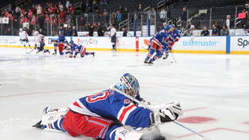 NEW YORK, NY - NOVEMBER 24: Alexandar Georgiev #40 of the New York Rangers stretches during warmups before the game against the Washington Capitals at Madison Square Garden on November 24, 2018 in New York City. (Photo by Jared Silber/NHLI via Getty Images)