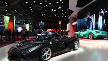 A LaFerrari Aperta automobile, produced by Ferrari NV, sits on the company's stand during the second press day of the Paris Motor Show at Porte de Versailles exhibition center in Paris, France, on Friday, Sept. 30, 2016. Ford Motor Co. and Rolls-Royce are among the companies skipping the car show, also known as Mondial de L'Automobile, as the once-unmissable event succumbs to changes sweeping the auto industry. Photographer: Jasper Juinen/Bloomberg via Getty Images