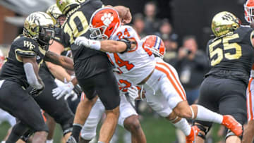 Clemson safety Tyler Venables (24) blitzes Wake Forest quarterback Sam Hartman (10) during the second quarter at Truist Field in Winston-Salem, North Carolina Saturday, September 24, 2022.Ncaa Football Clemson At Wake Forest