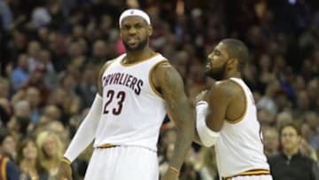 Dec 9, 2014; Cleveland, OH, USA; Cleveland Cavaliers forward LeBron James (23) celebrates with guard Kyrie Irving (2) after scoring in the fourth quarter against the Toronto Raptors at Quicken Loans Arena. Mandatory Credit: David Richard-USA TODAY Sports