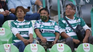 Some Santos Laguna fans wore masks to protect against the Covid-19 virus while attending the team's March 1 home game against Atlas. (Photo by Armando Marin/Jam Media/Getty Images)