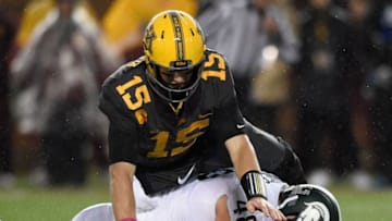 MINNEAPOLIS, MN - OCTOBER 14: Kenny Willekes #48 of the Michigan State Spartans recovers a fumble as quarterback Conor Rhoda #15 of the Minnesota Golden Gophers tackles him during the first quarter of the game on October 14, 2017 at TCF Bank Stadium in Minneapolis, Minnesota. (Photo by Hannah Foslien/Getty Images)