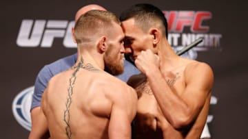 BOSTON, MA - AUGUST 16: (L-R) Opponents Conor McGregor and Max Holloway face off during the UFC weigh-in inside TD Garden on August 16, 2013 in Boston, Massachusetts. (Photo by Josh Hedges/Zuffa LLC/Zuffa LLC via Getty Images)