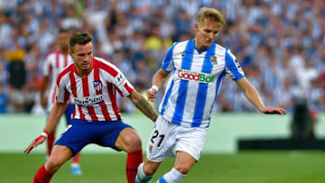 Real Sociedad's Norwegian midfielder Martin Odegaard (R) vies with Atletico Madrid's midfielder Saul Niguez during the Spanish league football match Real Sociedad against Club Atletico de Madrid at The Anoeta Stadium in San Sebastian on September 14, 2019. (Photo by ANDER GILLENEA / AFP) (Photo credit should read ANDER GILLENEA/AFP/Getty Images)