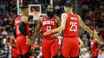 HOUSTON, TEXAS - MARCH 10: James Harden #13 of the Houston Rockets talks with Austin Rivers #25 in the second half against the Minnesota Timberwolves at Toyota Center on March 10, 2020 in Houston, Texas. NOTE TO USER: User expressly acknowledges and agrees that, by downloading and or using this photograph, User is consenting to the terms and conditions of the Getty Images License Agreement. (Photo by Tim Warner/Getty Images)