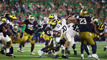 SOUTH BEND, IN - SEPTEMBER 01: Karan Higdon #22 of the Michigan Wolverines carries the ball against the Notre Dame Fighting Irish in the escond quarter at Notre Dame Stadium on September 1, 2018 in South Bend, Indiana. (Photo by Gregory Shamus/Getty Images)