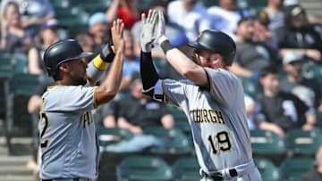CHICAGO, IL - MAY 09: Elias Diaz #32 (L) and Colin Moran #19 of the Pittsburgh Pirates celebrate after scoring the game winning runs in the 9th inning against the Chicago White Sox at Guaranteed Rate Field on May 9, 2018 in Chicago, Illinois. The Pirates defeated the White Sox 6-5. (Photo by Jonathan Daniel/Getty Images)