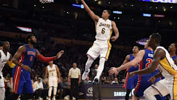Nov 15, 2015; Los Angeles, CA, USA; Los Angeles Lakers guard Jordan Clarkson (6) shoots the ball against Detroit Pistons center Andre Drummond (0) during the second quarter at Staples Center. Mandatory Credit: Richard Mackson-USA TODAY Sports