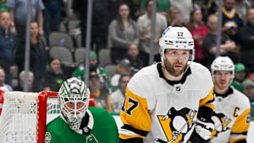 Mar 23, 2023; Dallas, Texas, USA; Pittsburgh Penguins right wing Bryan Rust (17) and Dallas Stars goaltender Jake Oettinger (29) in action during the game between the Dallas Stars and the Pittsburgh Penguins at American Airlines Center. Mandatory Credit: Jerome Miron-USA TODAY Sports