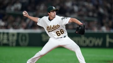 TOKYO, JAPAN - MARCH 20: Pitcher Ryan Dull #66 of the Oakland Athletics throws in the 5th inning during the game between Seattle Mariners and Oakland Athletics at Tokyo Dome on March 20, 2019 in Tokyo, Japan. (Photo by Masterpress/Getty Images)