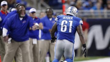 Sep 3, 2015; Detroit, MI, USA; Detroit Lions defensive end Kerry Hyder (61) chases the fumble from Buffalo Bills quarterback Matt Simms (not pictured) during the third quarter of a preseason NFL football game at Ford Field. Lions beat the Bills 17-10. Mandatory Credit: Raj Mehta-USA TODAY Sports