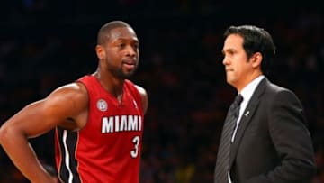 Mar. 3, 2013; New York, NY, USA; Miami Heat shooting guard Dwyane Wade (3) talks with Miami Heat head coach Erik Spoelstra against the New York Knicks during the first half at Madison Square Garden. Mandatory Credit: Debby Wong-USA TODAY Sports