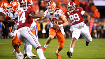 SANTA CLARA, CA - JANUARY 07: Trevor Lawrence #16 of the Clemson Tigers rushes against the Alabama Crimson Tide during the College Football Playoff National Championship held at Levi's Stadium on January 7, 2019 in Santa Clara, California. Clemson defeated Alabama 44-16. (Photo by Jamie Schwaberow/Getty Images)