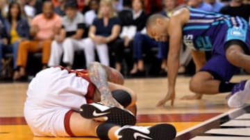 Nov 23, 2014; Miami, FL, USA; Miami Heat forward Chris Andersen (11) is injured on a play against Charlotte Hornets during the first half at American Airlines Arena. Mandatory Credit: Steve Mitchell-USA TODAY Sports