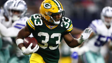 Oct 6, 2019; Arlington, TX, USA; Green Bay Packers running back Aaron Jones (33) runs with the ball in the tird quarter against the Dallas Cowboys at AT&T Stadium. Mandatory Credit: Matthew Emmons-USA TODAY Sports
