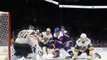 UNIONDALE, NEW YORK - DECEMBER 05: Anders Lee #27 of the New York Islanders misses a third period chance against Malcolm Subban #30 of the Vegas Golden Knights at NYCB Live's Nassau Coliseum on December 05, 2019 in Uniondale, New York. The Islanders defeated the Golden Knights 3-2 in overtime. (Photo by Bruce Bennett/Getty Images)