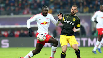 LEIPZIG, GERMANY - JANUARY 19: Dayot Upamecano of RB Leipzig and Paco Alcacer of Borussia Dortmund battle for the ball during the Bundesliga match between RB Leipzig and Borussia Dortmund at Red Bull Arena on January 19, 2019 in Leipzig, Germany. (Photo by TF-Images/TF-Images via Getty Images)