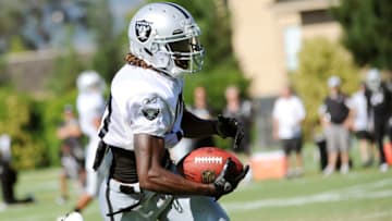 NAPA, CA - AUGUST 5: Denarius Moore #17 of the Oakland Raiders participates runs with the ball after catching a pass during practice at the Oakland Raiders training facility on August 5, 2011 in Napa, California. (Photo by Thearon W. Henderson/Getty Images)