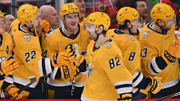 Dec 21, 2022; Chicago, Illinois, USA; Nashville Predators forward Thomas Novak (82) celebrates at the bench after scoring a goal in the third period against the Chicago Blackhawks at United Center. Nashville defeated Chicago 4-2. Mandatory Credit: Jamie Sabau-USA TODAY Sports