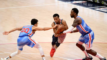 WASHINGTON, DC - JANUARY 31: Ish Smith #14 of the Washington Wizards dribbles in front of Landry Shamet #20 and Jeff Green #8 of the Brooklyn Nets (Photo by Will Newton/Getty Images)