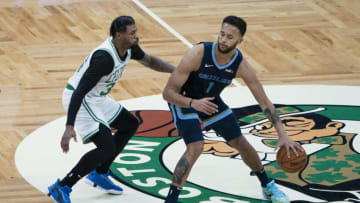 Dec 30, 2020; Boston, Massachusetts, USA; Memphis Grizzlies forward Kyle Anderson (1) dribbles the ball against Boston Celtics point guard Marcus Smart (36) during the first quarter at TD Garden. Mandatory Credit: Gregory Fisher-USA TODAY Sports
