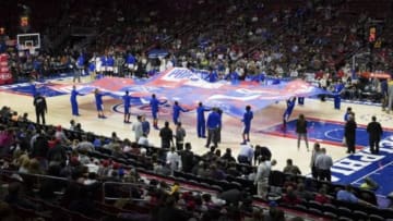 Nov 18, 2015; Philadelphia, PA, USA; The Sixers flight squad holds a giant Philadelphia 76ers flag on the court to start the second half against the Indiana Pacers at Wells Fargo Center. The Pacers won 112-85. Mandatory Credit: Bill Streicher-USA TODAY Sports